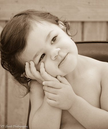 Sepia tone of toddler thinking